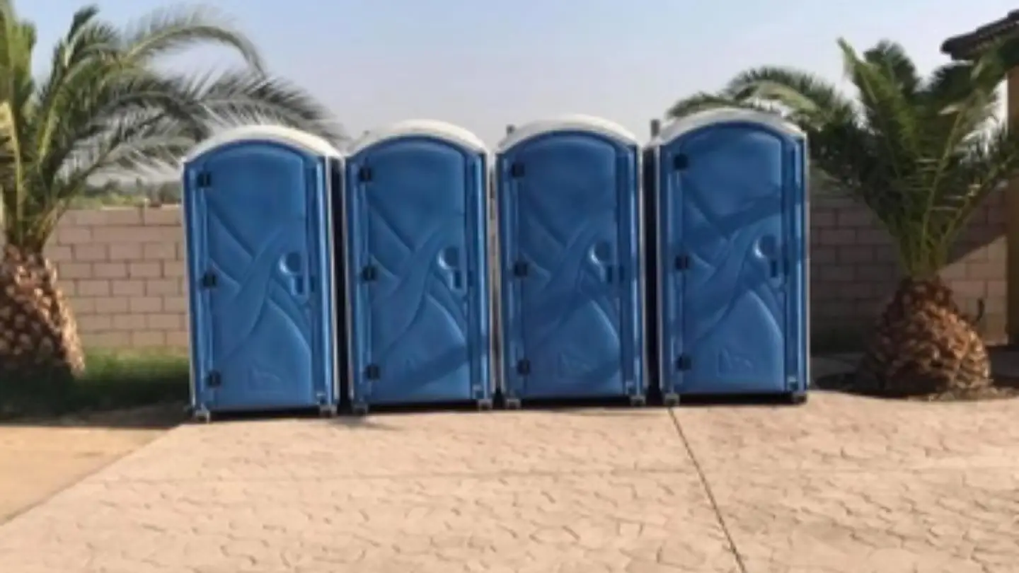 Four porta potties in a row